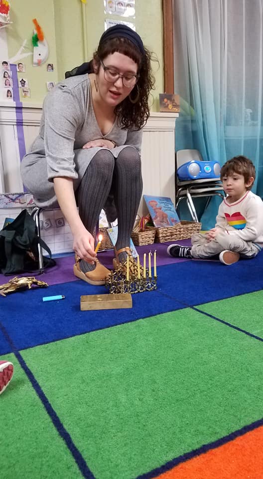 rabbi visits preschool for hanukkah